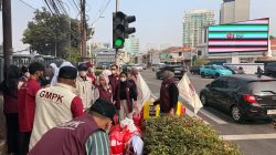 Peduli Korban Anak Krakatau, GMPK DKI Bagikan 10.000 Masker dan 700 Nasi Kotak